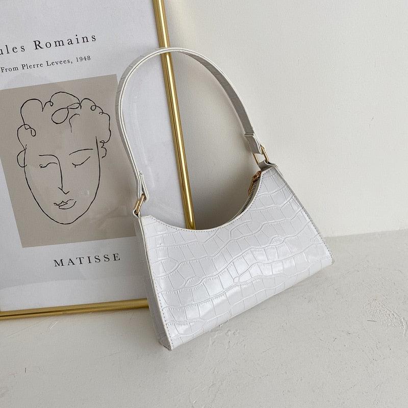 Damen Handtasche mit Krokodilmuster – Accessoire für jeden Tag